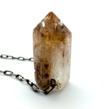 Quartz Crystal with Golden Colored Chlorite Inclusions